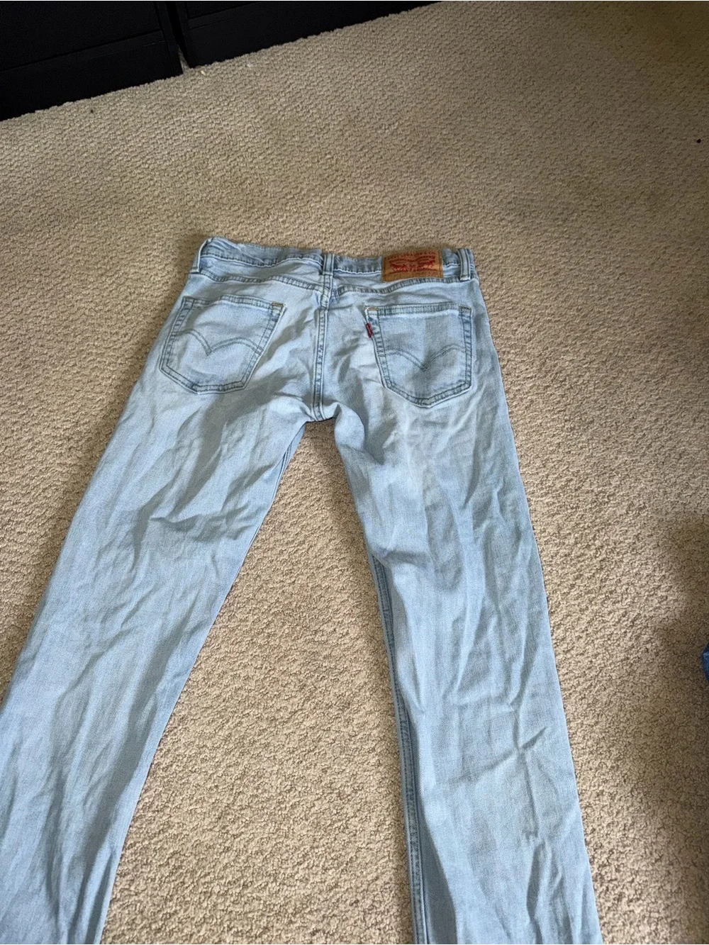 Levi's Light Blue Denim Jeans with Tan Leather Patch